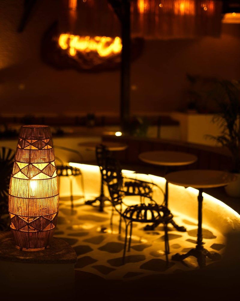 Lantern-lit courtyard seating at night